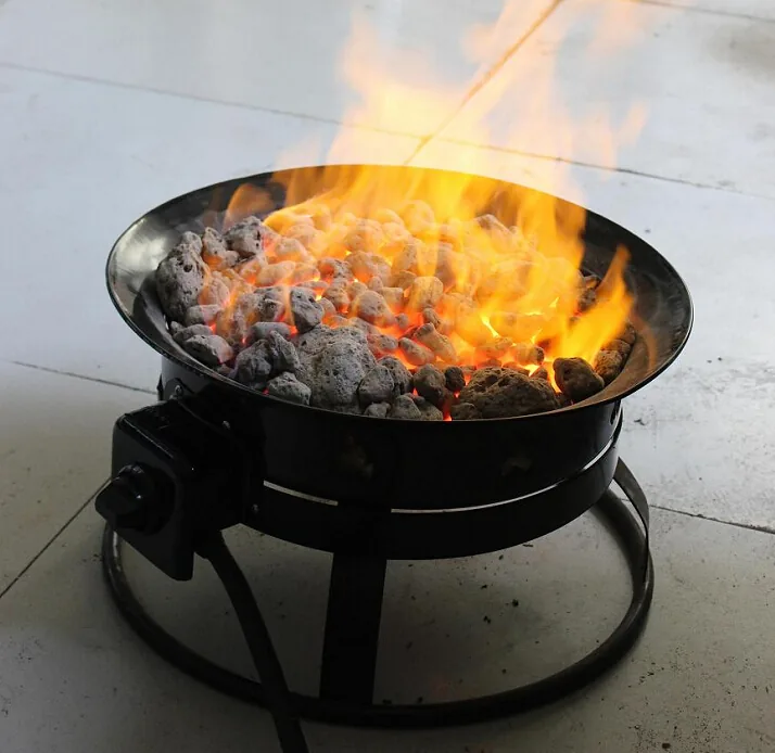 Round BBQ fire pan during a burning test