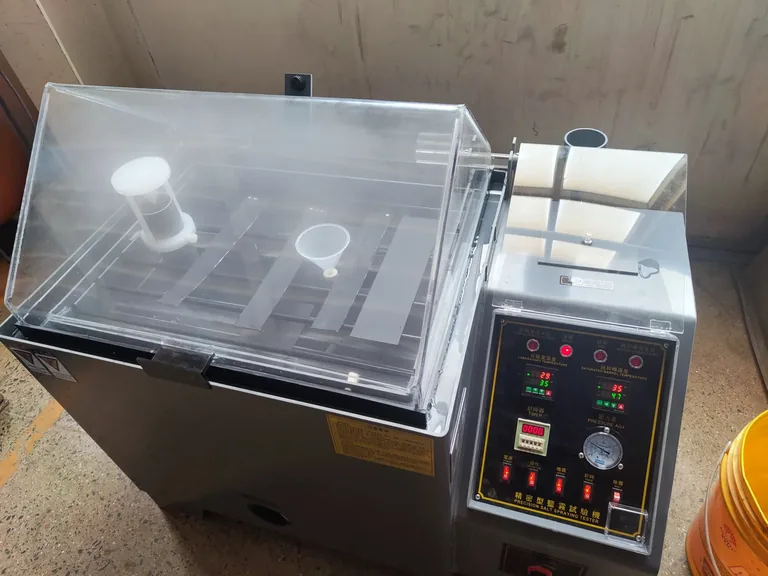 Salt spray testing equipment with material samples